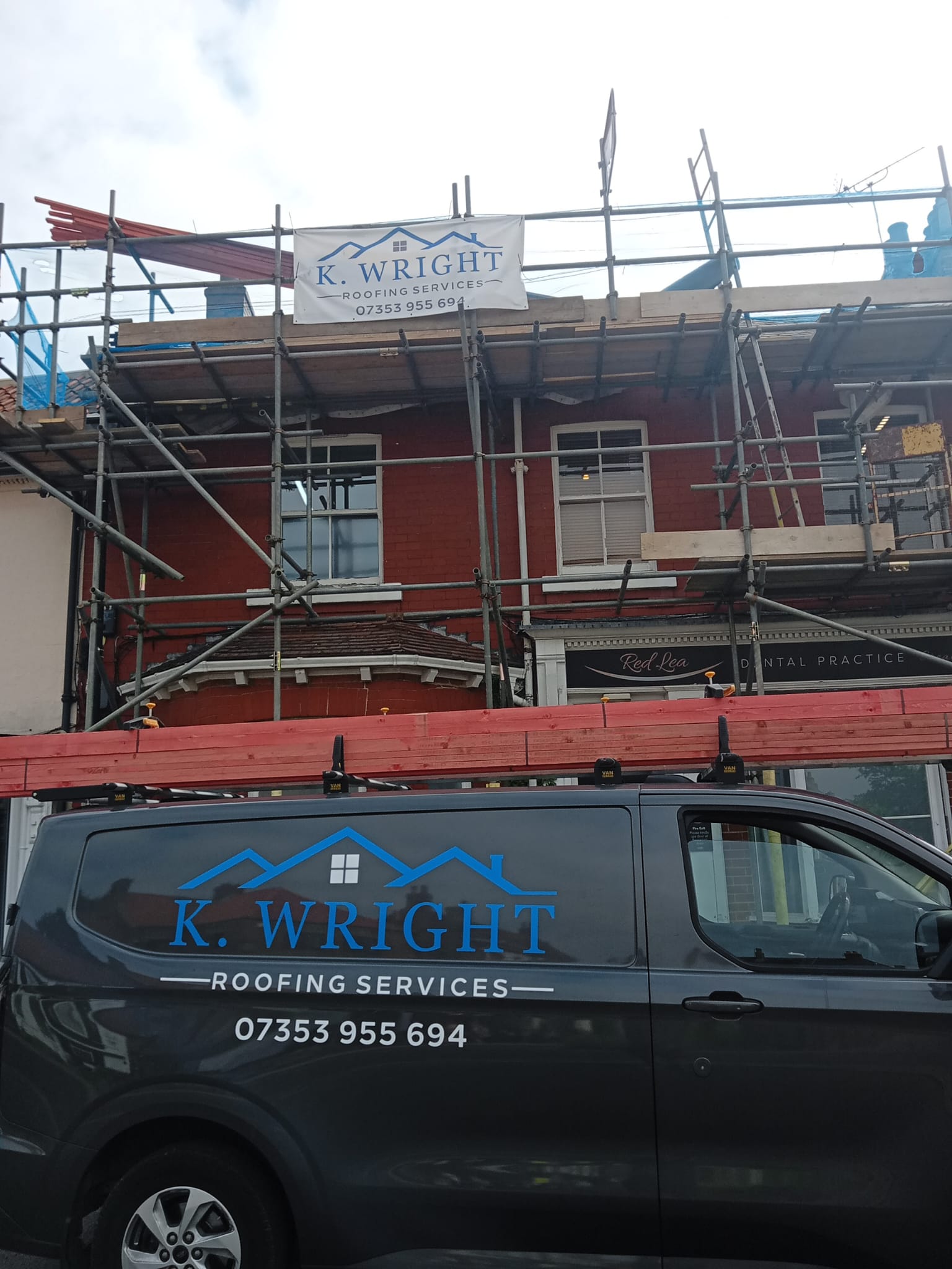 K. Wright Roofing Services van at an active roofing project in Nottingham